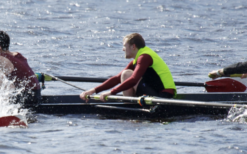 crew rowing choppily
